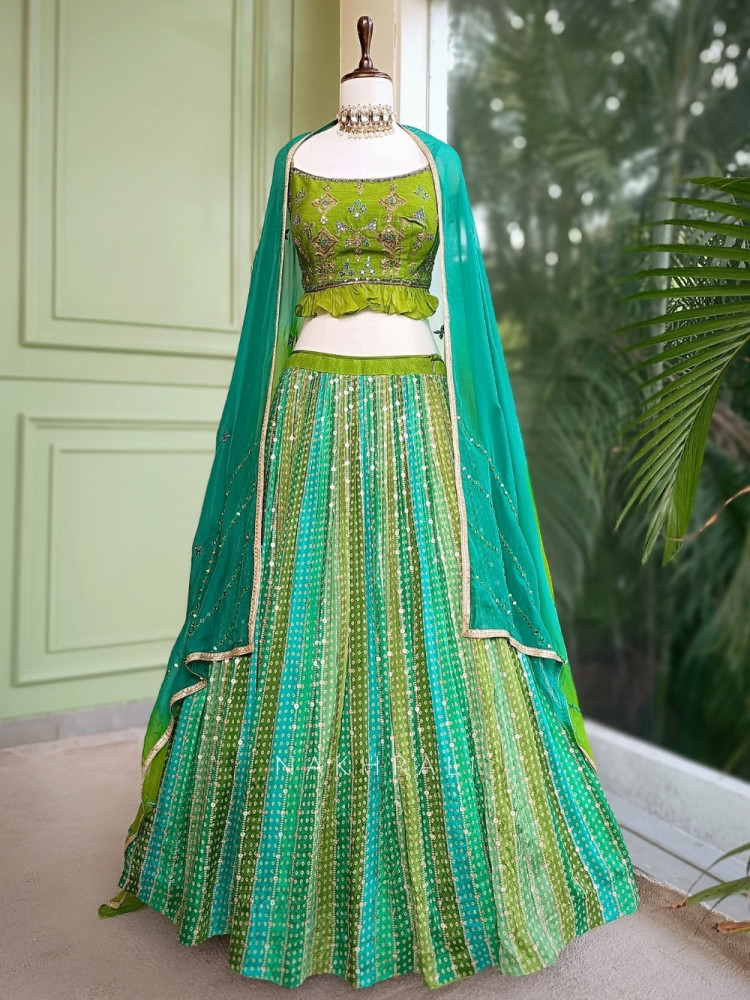 Image of Ruhika Dual-Tone Green Bandhani Lehenga with Mirror &amp; Sequin Work