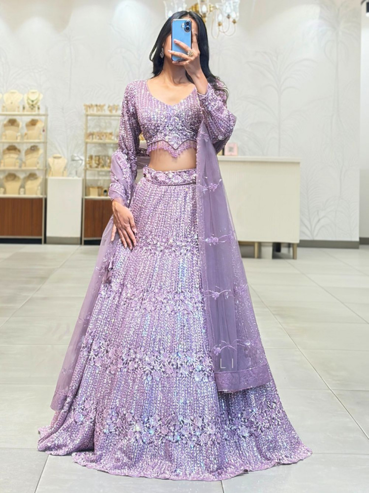 Image of Lavika Purple Net Lehenga Set with Detailed Sequin Work