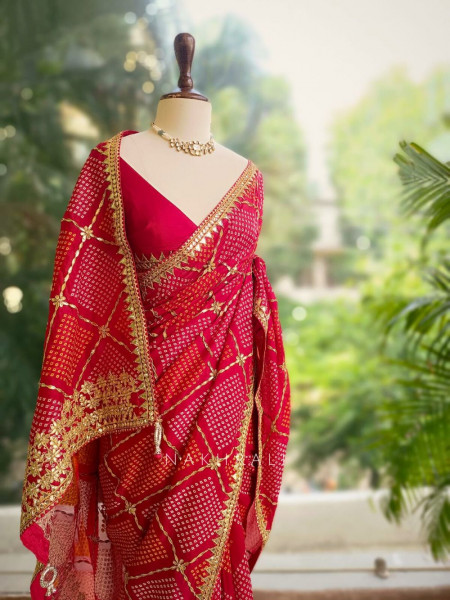 Rang Leher Red Bandhani Saree with Embroidered Border