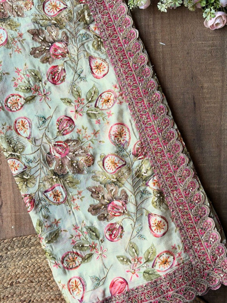 Nirvitha Pista Green Saree with Printed Embroidery and Sequin Work