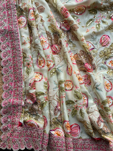 Nirvitha Pista Green Saree with Printed Embroidery and Sequin Work