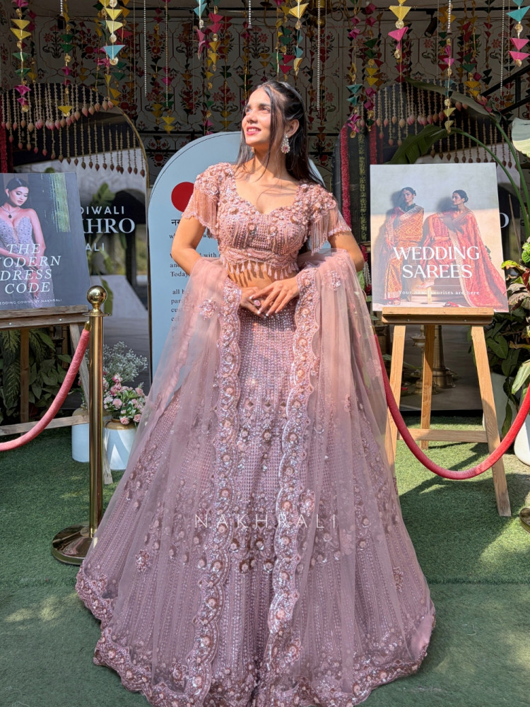 Image of Roselia Pink Net Bridal Lehenga with  Handwork