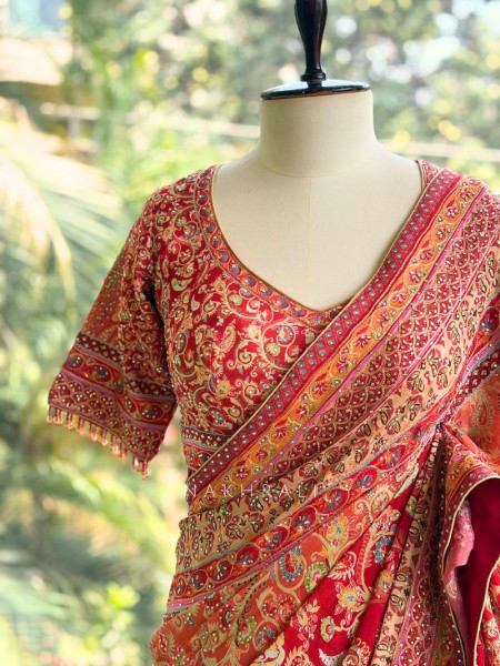 Paisley Printed Red Saree with Stone Embellished Readymade Blouse