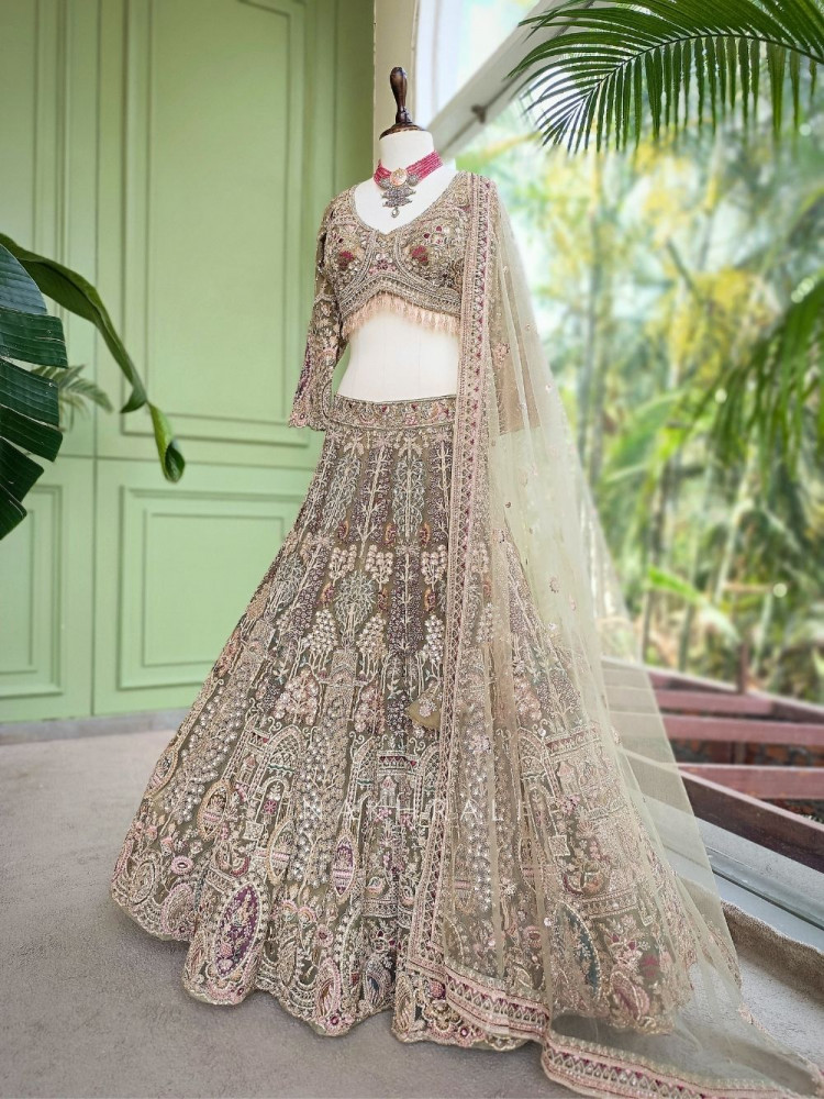 Image of Mivara Pista Green Net Lehenga Set with Sequin Embroidery