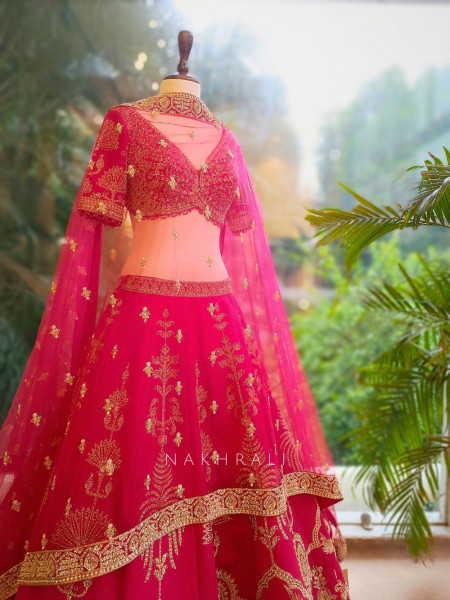 Rajkumari Red Silk Bridal Lehenga with Stone & Zari Work