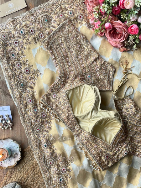 Avadhira Cream Saree with Cut Dana, Beads and Sequin Work
