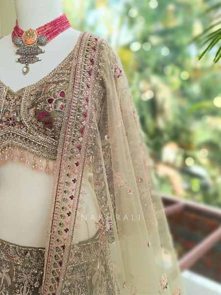 Mivara Pista Green Net Lehenga Set with Sequin Embroidery