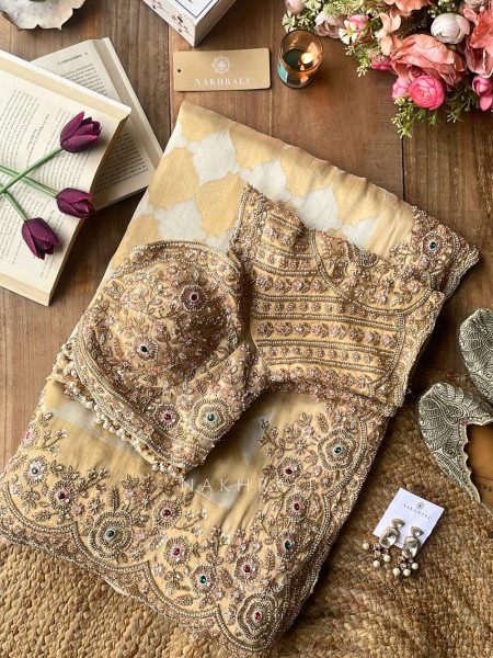 Avadhira Cream Saree with Cut Dana, Beads and Sequin Work