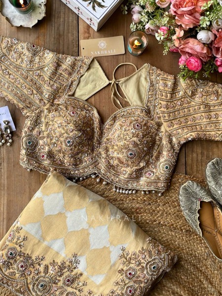 Avadhira Cream Saree with Cut Dana, Beads and Sequin Work