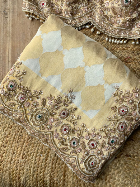 Avadhira Cream Saree with Cut Dana, Beads and Sequin Work