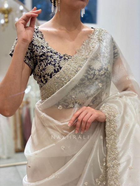 Niranjani Cream Soft Tissue Saree with Zari Work