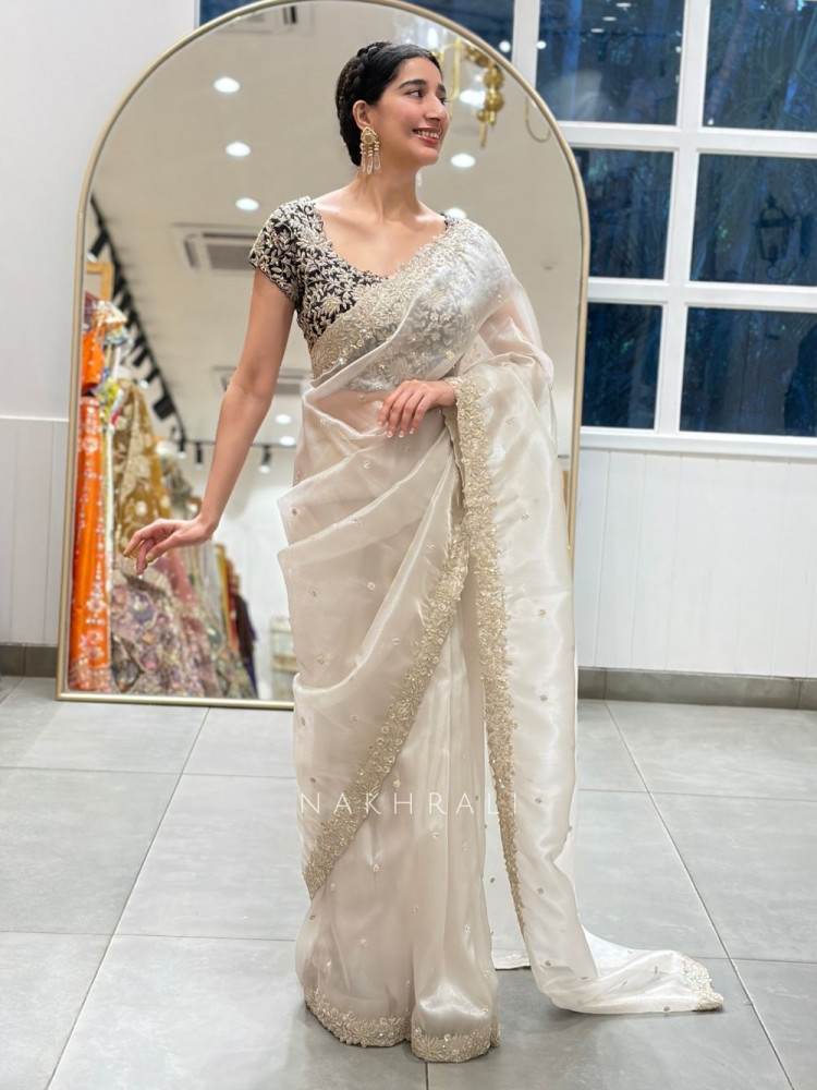 Image of Niranjani Cream Soft Tissue Saree with Zari Work