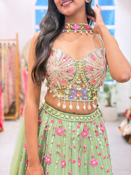 Amoret  Green Raw Silk & Tulle Carnival Lehenga Set With 3D Floral, Cutdana & Cowrie Work