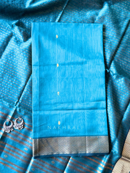 Koshika Teal Blue Maheshwari Dress Material with Zari Border