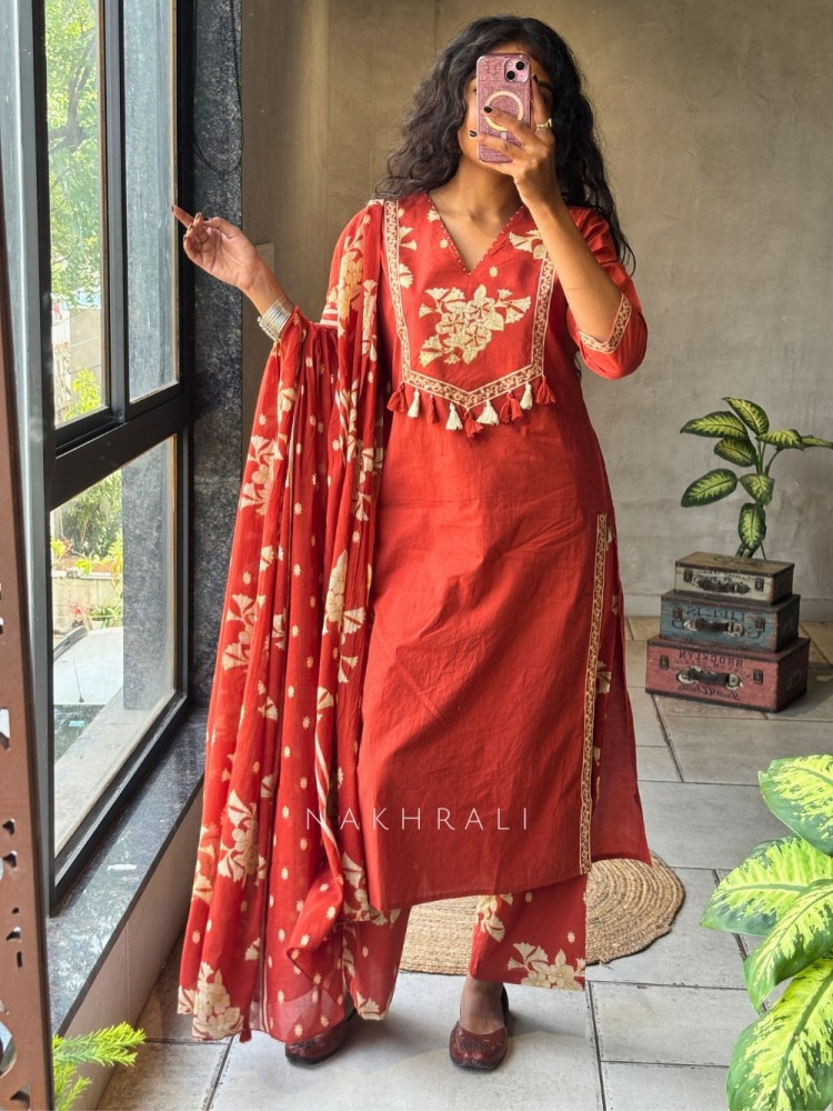 Image of Kavishi Orange Cotton Suit Set with Floral Yoke Detail