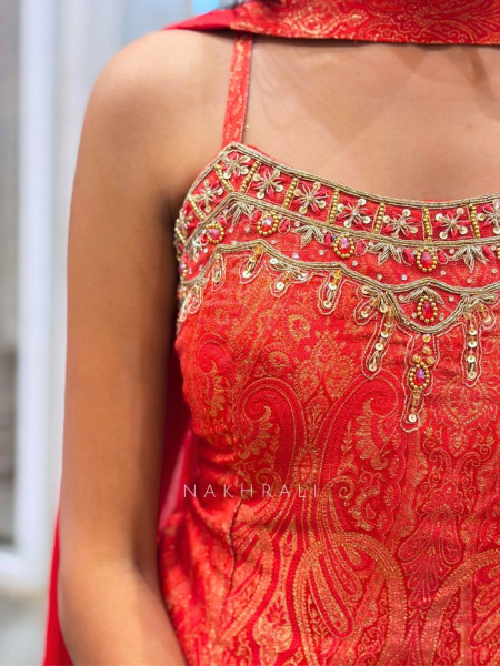 Kaelina Orange Suit Set with Intricate Paisley Embellished Work