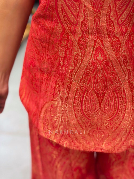 Kaelina Orange Suit Set with Intricate Paisley Embellished Work