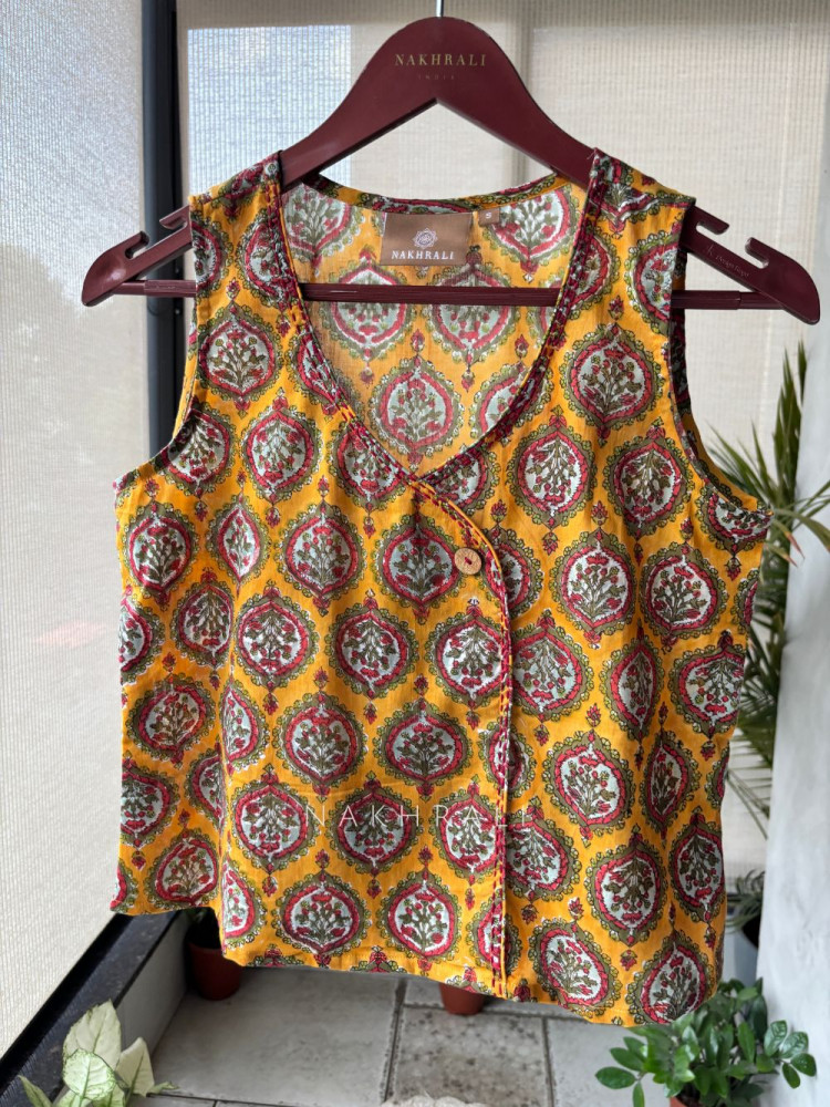 Image of Flexora Yellow Printed Sleeveless Top with Overlap Neck Detail