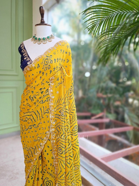 Mehrang Yellow Bandhani Saree with Gota Border