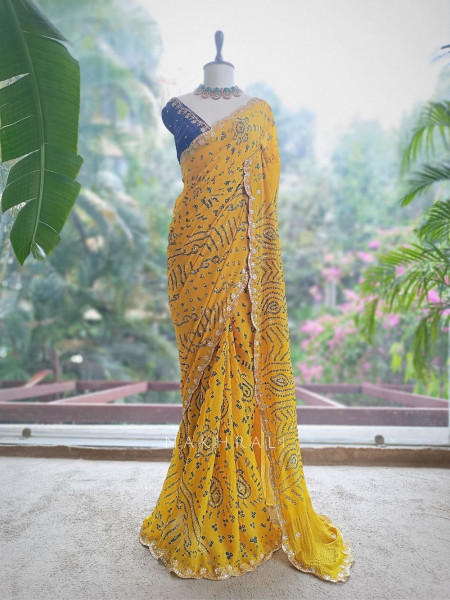 Mehrang Yellow Bandhani Saree with Gota Border