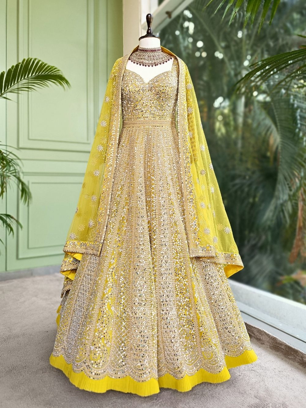 Golden Ray Yellow Anarkali with Sparkling Mirror and Zari Work Golden Ray Yellow Anarkali with Sparkling Mirror and Zari Work