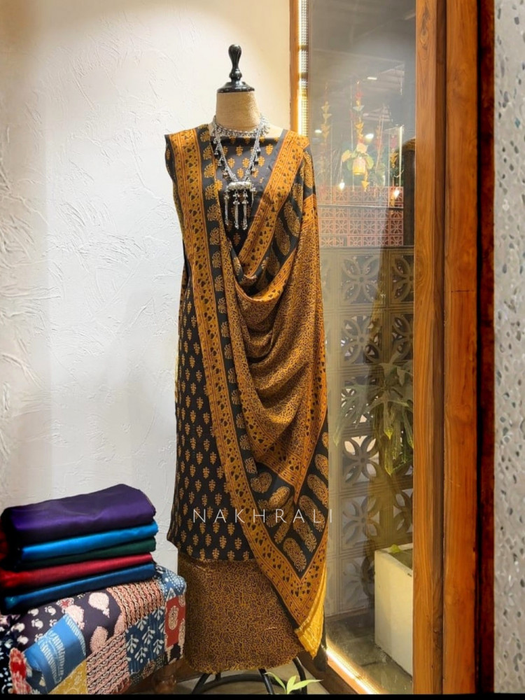 Image of Prithika Mustard Cotton Dress Material With Bagh Print