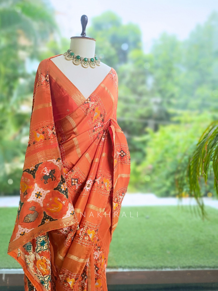 Image of Kalyani Plum Orange  Patola Saree With With Running Blouse Piece