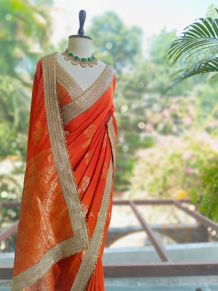 Image of Tavira Orange Saree with Broad Border and Unstitched Blouse Piece