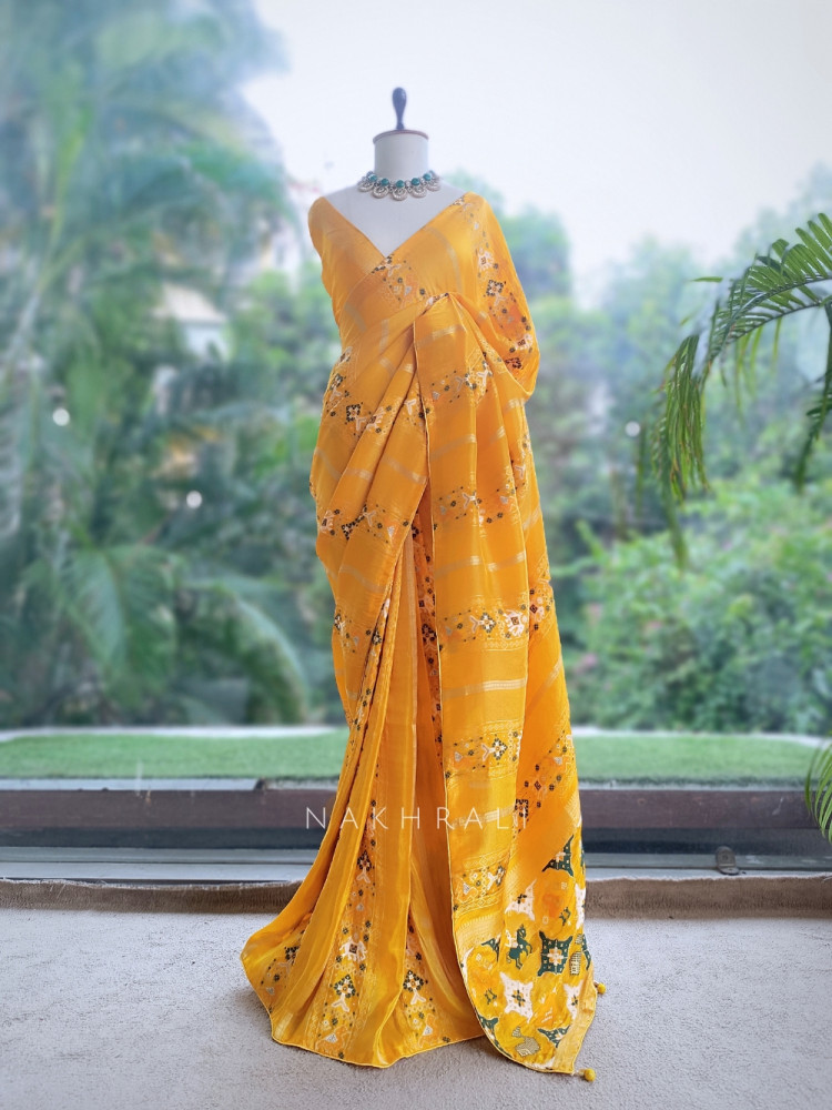 Image of Kalyani Plum Yellow Patola Saree With With Running Blouse Piece