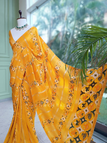 Kalyani Plum Yellow Patola Saree With With Running Blouse Piece