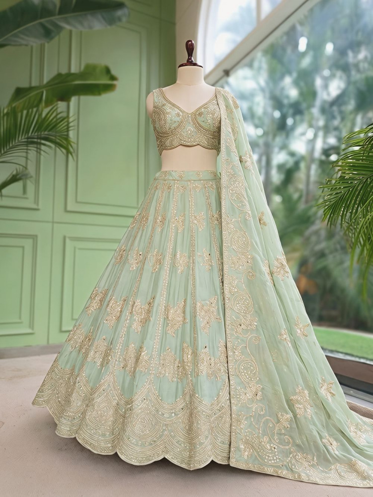 Image of Pank Pista Green Banarasi Silk Lehenga Set With Sequin Floral &amp; Paisley Work