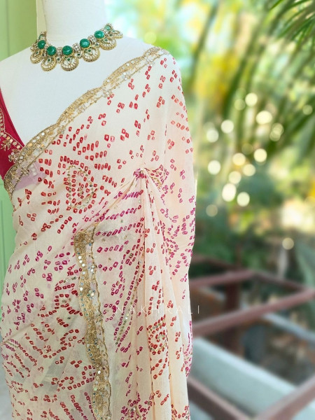 Mehrang cream Bandhani Saree with Gota Border
