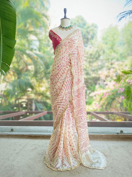 Mehrang cream Bandhani Saree with Gota Border