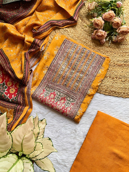 Elegant Printed Yellow Dress Material with Embroidered Details