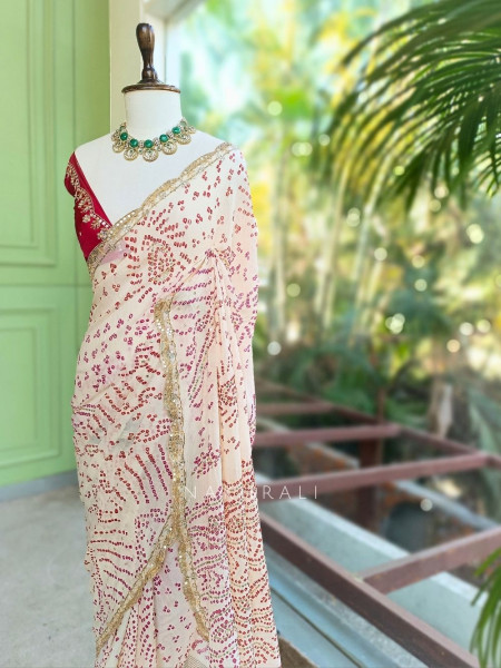 Mehrang cream Bandhani Saree with Gota Border