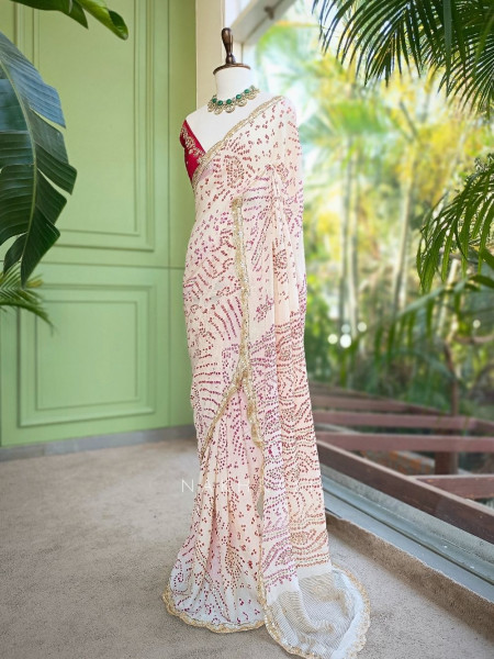 Mehrang cream Bandhani Saree with Gota Border