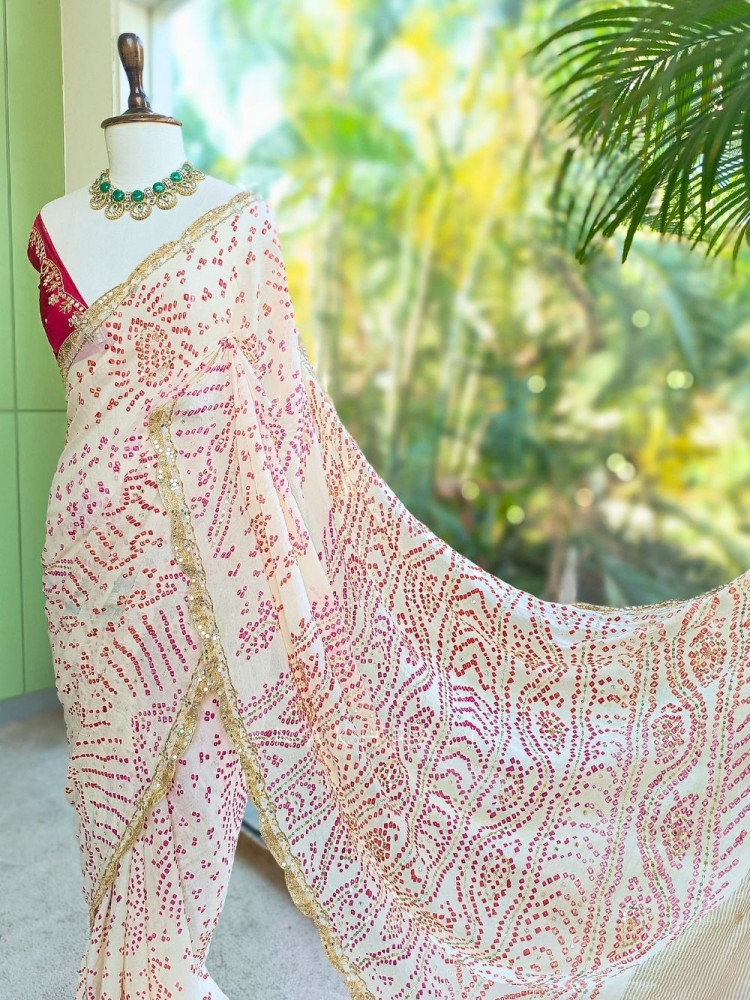 Image of Mehrang cream Bandhani Saree with Gota Border