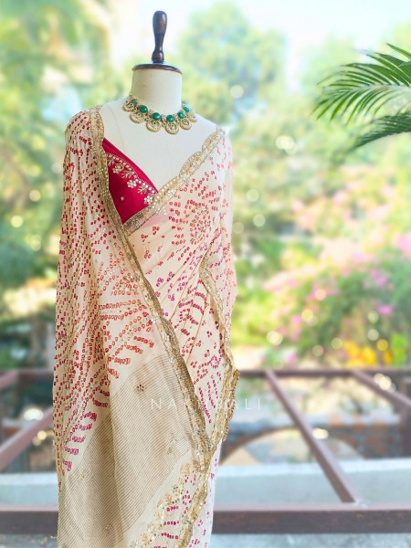 Mehrang cream Bandhani Saree with Gota Border