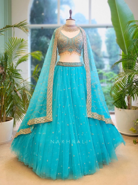 Lustre Enchant Blue Net Lehenga with Heavy Embroidered Blouse