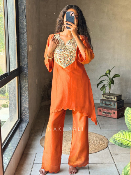 Zarika Orange Kurti Pant Set with Mirror Work Yoke