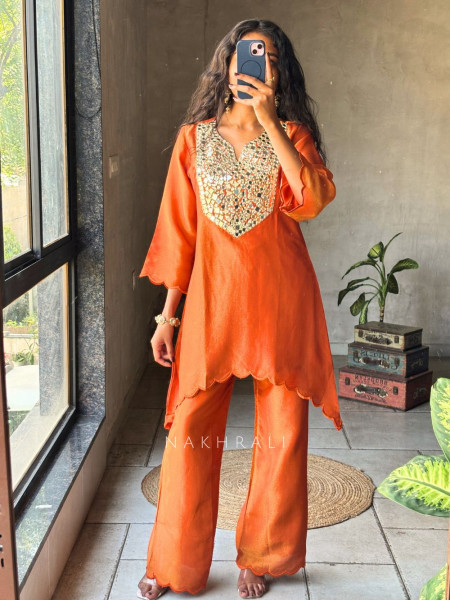 Zarika Orange Kurti Pant Set with Mirror Work Yoke