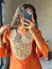 Zarika Orange Kurti Pant Set with Mirror Work Yoke