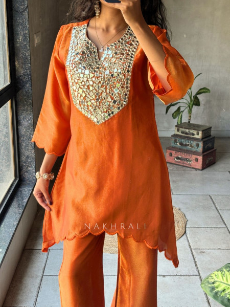 Zarika Orange Kurti Pant Set with Mirror Work Yoke