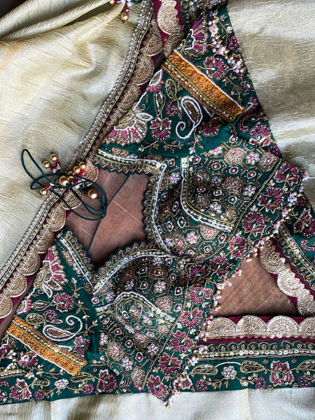 Navpallav Bottle Green Tissue Saree with Sequin Bead Embroidery