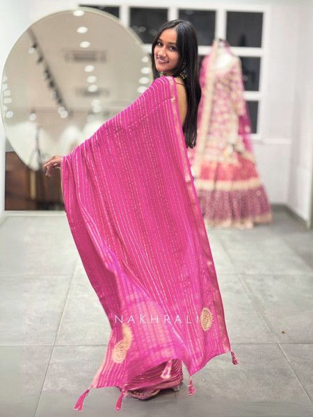 The Aurelia Crest Fuchsia Dola Silk Saree with Sequin and Cut Dana Embedded Readymade Blouse