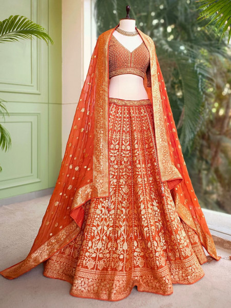 Vedhika Glint Orange Brocade Lehenga with Zari and Sequin Work