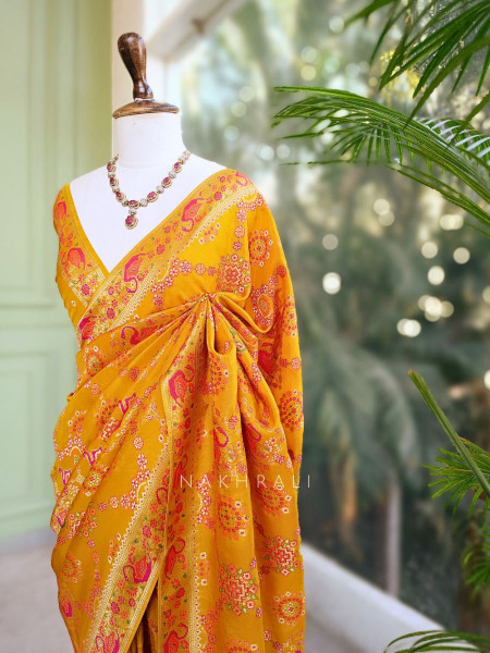 Solvara Yellow Bandhani Saree with Traditional Border