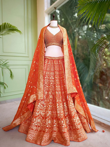Vedhika Glint Orange Brocade Lehenga with Zari and Sequin Work