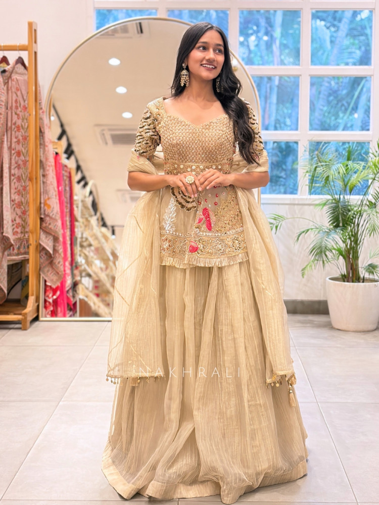 Image of Rasika Golden Indo-Western Lehenga Set with Embroidered Peplum