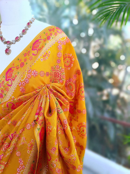 Solvara Yellow Bandhani Saree with Traditional Border